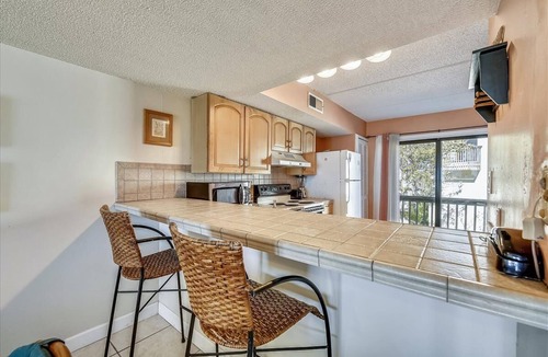 St. George Island Condo | WATCH DOLPHINS frolic and the antics of shorebirds as you enjoy the expansive gulf view!