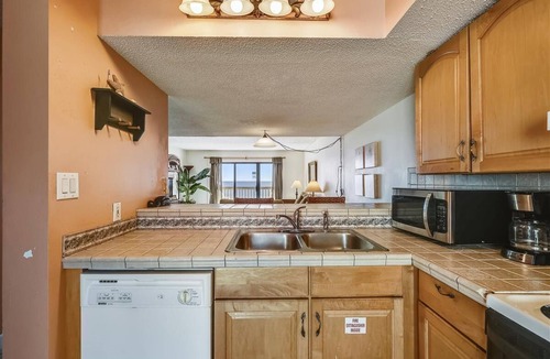 St. George Island Condo | WATCH DOLPHINS frolic and the antics of shorebirds as you enjoy the expansive gulf view!