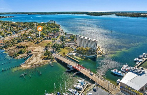 Panama City House | Watch the boats passing through Massalina Bayou from the front porch.