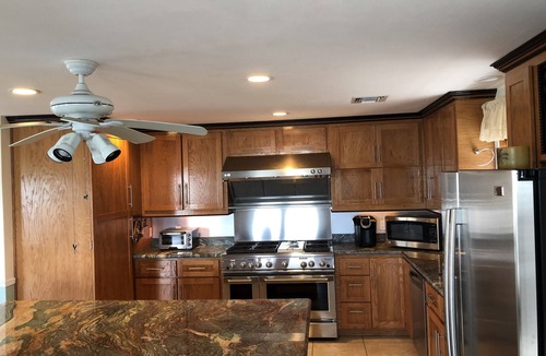 Breezeswept Beach Estates House | Water Front Home. Direct deep water access with private pool/spa/dock & Elevator