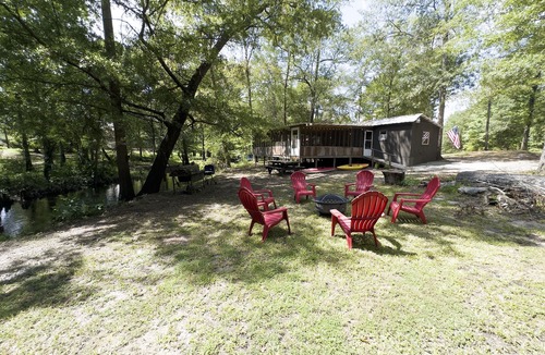 Karnack Cabin | WATERFRONT.Cozy Cabin on the water- quiet tributary of Caddo Lake! Pet friendly!