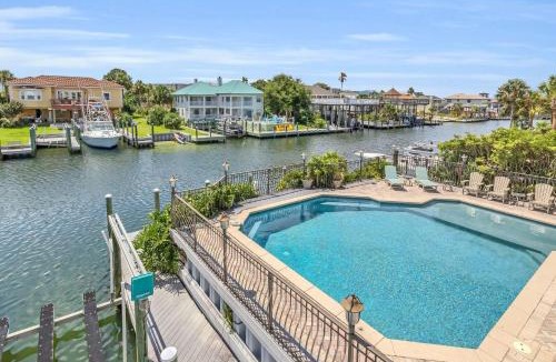 Holiday Isle House | Waterfront Dream House Pool Golf Cart & Dock
