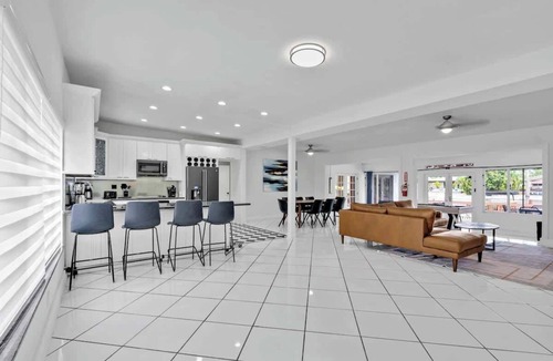 Poinsettia Heights House | Waterfront Heated Pool Home Game & 6 min Beach