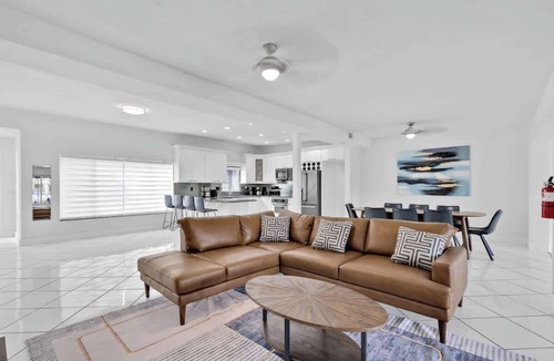 Poinsettia Heights House | Waterfront Heated Pool Home Game & 6 min Beach