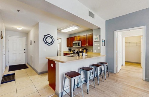 Waterside Village House | Waterfront Home Close to Beach with Shared Pool Hot Tub Free WiFi & Central AC