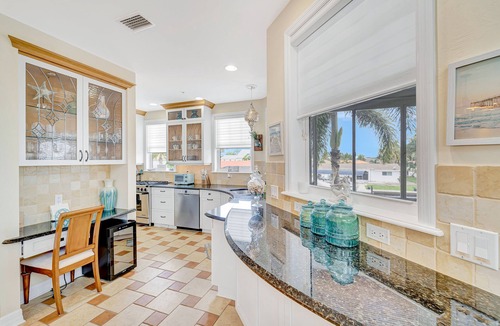 Matlacha House | Waterfront home with private pool, dock, patio, balconies, & bikes