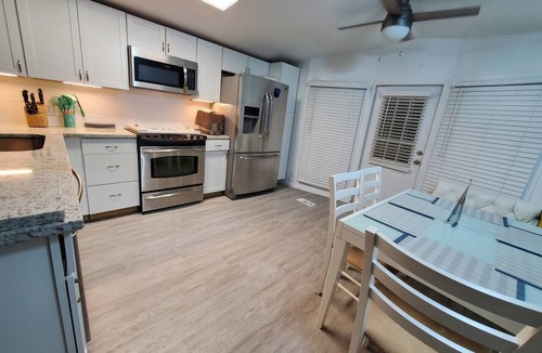Enchanted Oaks House | Waterfront Retreat, Spacious Outdoor Deck! Dogs