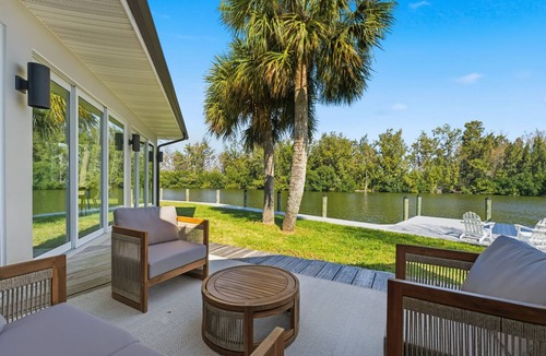 Cocoa Isles House | Waterfront with New POOL, Bikes, Hot Tub, Kayak, near downtown Cocoa Beach.