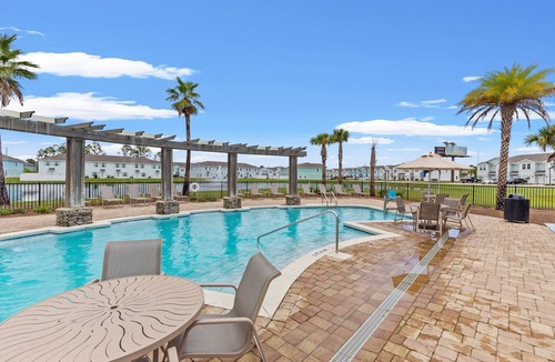 Thomas Drive House | Winter rental rates available! Close to Publix Sports Park! Community Pool!