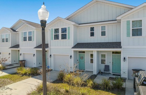 Thomas Drive House | Winter rental rates available! Close to Publix Sports Park! Community Pool!