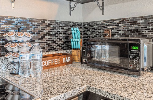 Garland House | Wonderful 3-bedroom retreat with Foosball, BBQ Grill, Pool, and Covered Patio