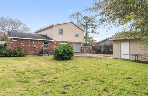 Slidell House | Your choice of room w/a private bathroom and dedicated half-bath.