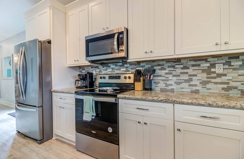 Mississippi City House | Your Coastal Escape - TIKI BAR, Steps to the Beach, Large Yard and Gulf Views!