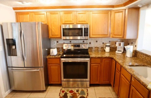 Aloha Gardens House | Your Holiday Retreat on the Waterfront- BBQ Games & Sun