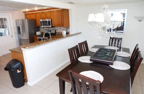 Aloha Gardens House | Your Holiday Retreat on the Waterfront- BBQ Games & Sun