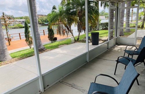 Aloha Gardens House | Your Holiday Retreat on the Waterfront- BBQ Games & Sun