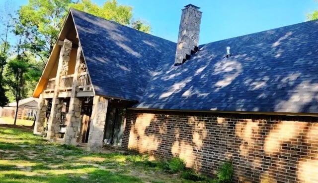 2 story rock house 3/2 near Texas A & M University corner lot on 1 acre.