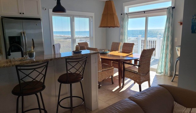 Beachfront home with beautiful view of beach and ocean.
