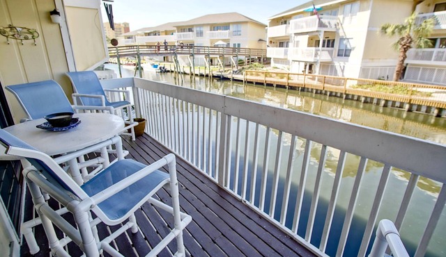 Canal Unit with 2 BR/2 Baths & Free Beach Setup!