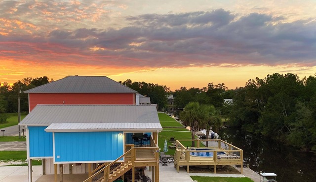 Cozy water front home with a swimming pool near beaches and Old Town BSL!