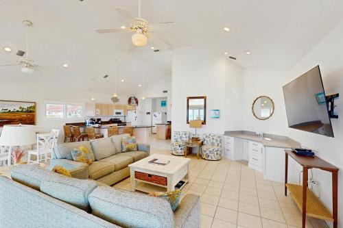 Dog-friendly beachfront home with private hot tub fireplace on-site pool AC