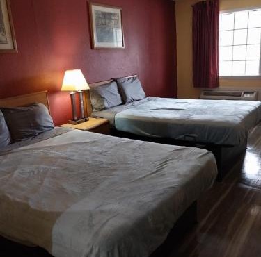 Gated 2 Double Beds Hotel Room 218