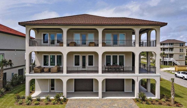 Luxury Casa Laguna Key 6 bedroom house steps to the beach and pool by Prickett Properties
