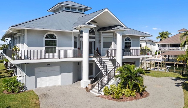 Luxury Waterfront Retreat with Gulf Access, Pool & Sunset Views
