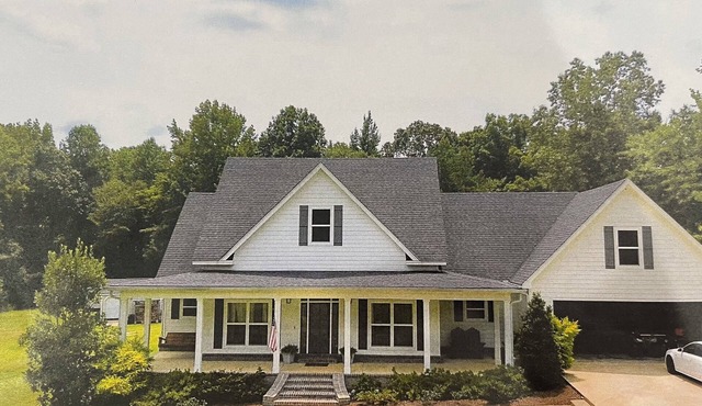 Quiet, secluded 4 bedroom home with large pool.
