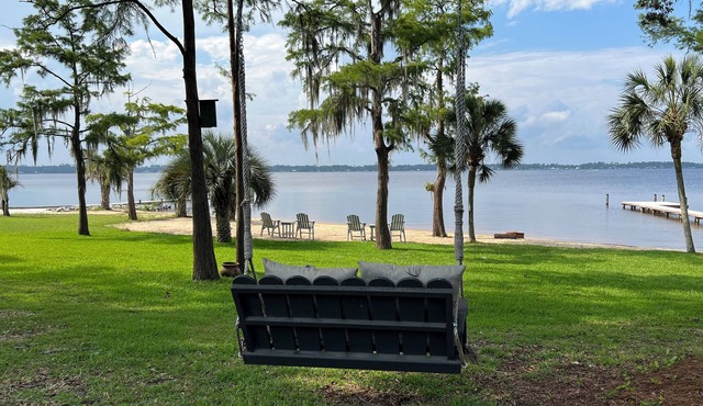 Rare bay waterfront home with 145' of SANDY BEACH! Pets welcome!