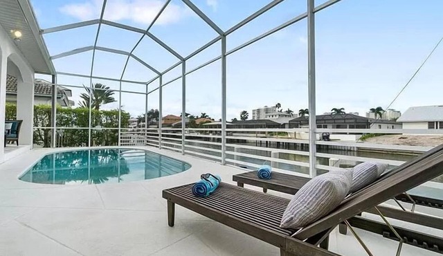 🌊 Sunshine Retreat | Pool + Sun Deck Walk to Vanderbilt Beach Canal Front