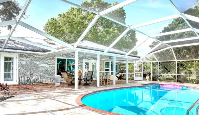 Tropical Oasis on double lot w/Pool, Pond, King Bed & Mosaics- Pet Friendly!