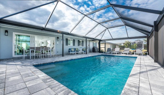Villa Capri | Waterfront Retreat with Heated Pool