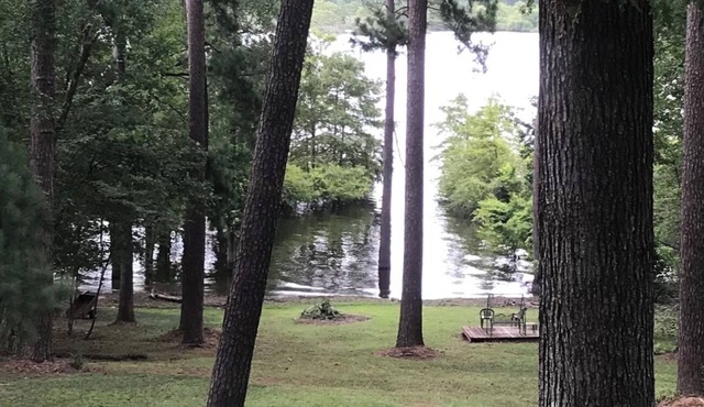 Waterfront home on a beautiful wooded, private1 acre lot on Sam Rayburn.