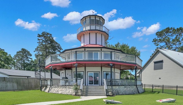 Waterfront Lighthouse with Large Dock for a Great Family Getaway