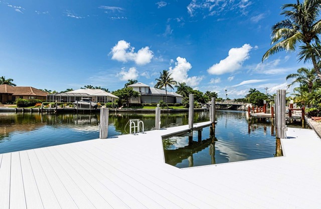 Enjoy Sunny warm days, lounging poolside at this home