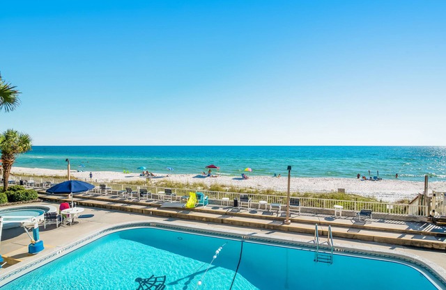 Gorgeous and cozy beachfront condo with shared pool and beach access