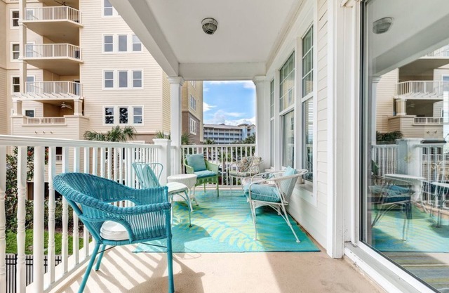 Spacious family condo with large balcony & shared pool and hot tub