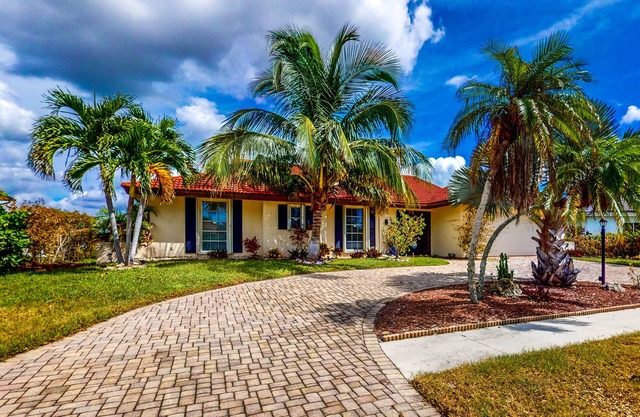 Waterfront Home with Private Dock & Enclosed Lanai - Near Residence Beach