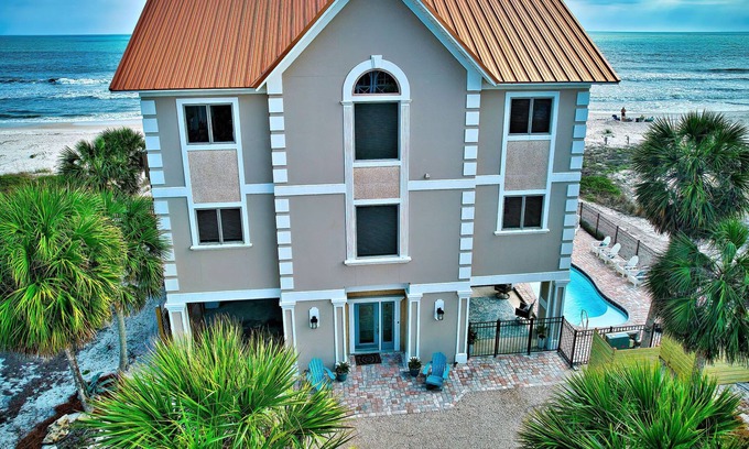 Plantation House | 5 BR 5 Bath BEACH FRONT home in The Plantation - located near community pool with access!