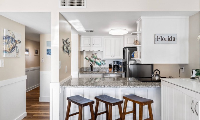 Holiday Isle Condo | Artistic Coastal themed Beachfront condo with incredible VIEWS! (712)