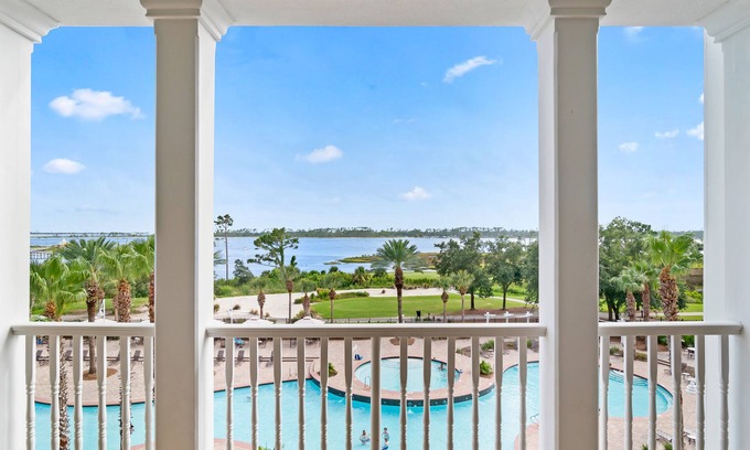 Upper Grand Lagoon Condo | Bayfront, 4th-floor condo with hot tub, pool & views of Nicklaus Golf Course