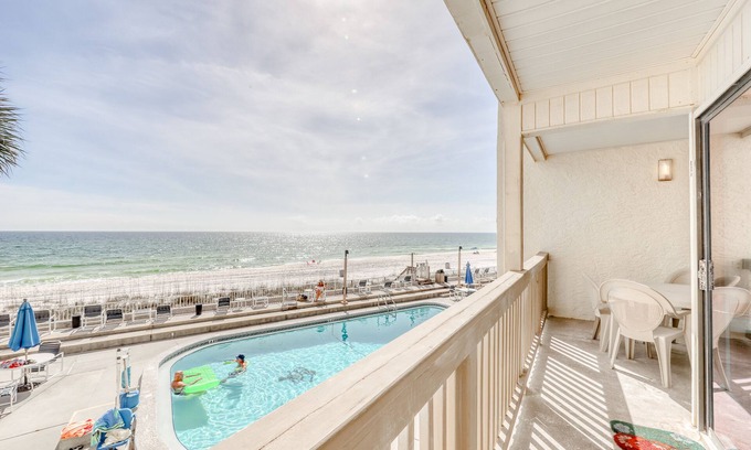 Fort Bay House | Beautiful beachfront condo with shared pool/hot tub and beach access