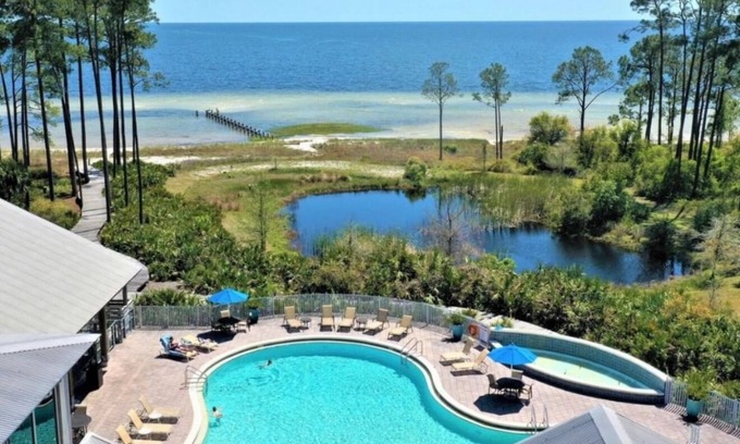 Panacea House | Charming Family beach getaway pool camp arcade bikes quiet St Teresa