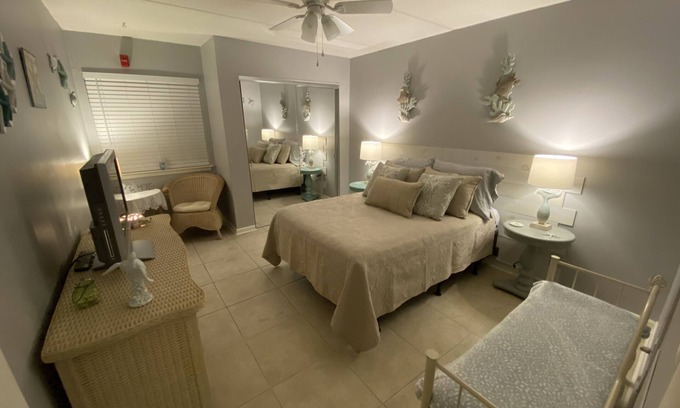 Mary Esther Condo | Comfy Condo with Water Views- Fishing Dock- Sleeps 4