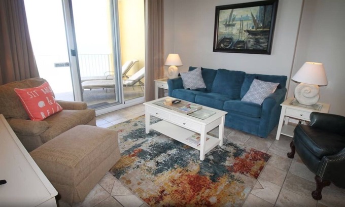West Panama City Beach Condo | Emerald Isle 1006 - Front row beach chair service included! Affordable rates!
