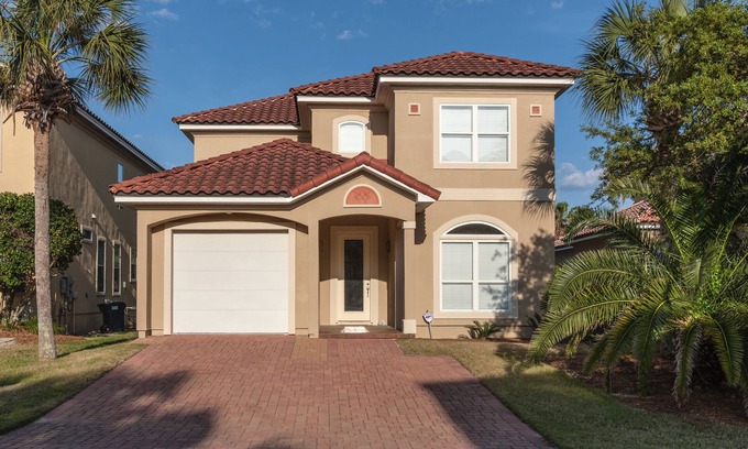 Fort Bay House | Exclusive private home in gated community across the street from the beach.