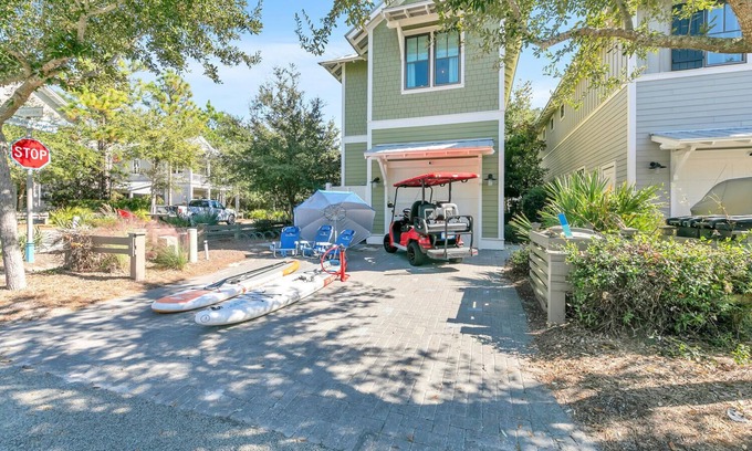 Forest District House | š GOLF CART ā PRIVATE BEACH 9 POOLS Luxurious WaterColor Cottage!