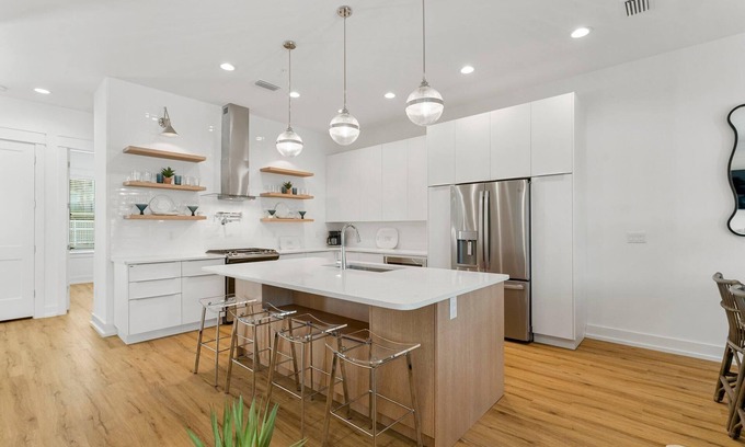 Silver Sands Beach House | Luxury custom townhome with private heated pool & elevator!