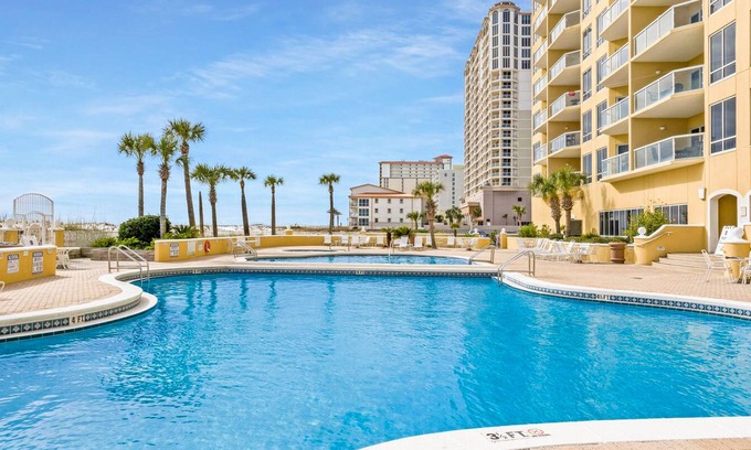 Villa Primera Condo | Modern 6th-floor condo with balcony, Gulf view, pool, hot tub, & gym